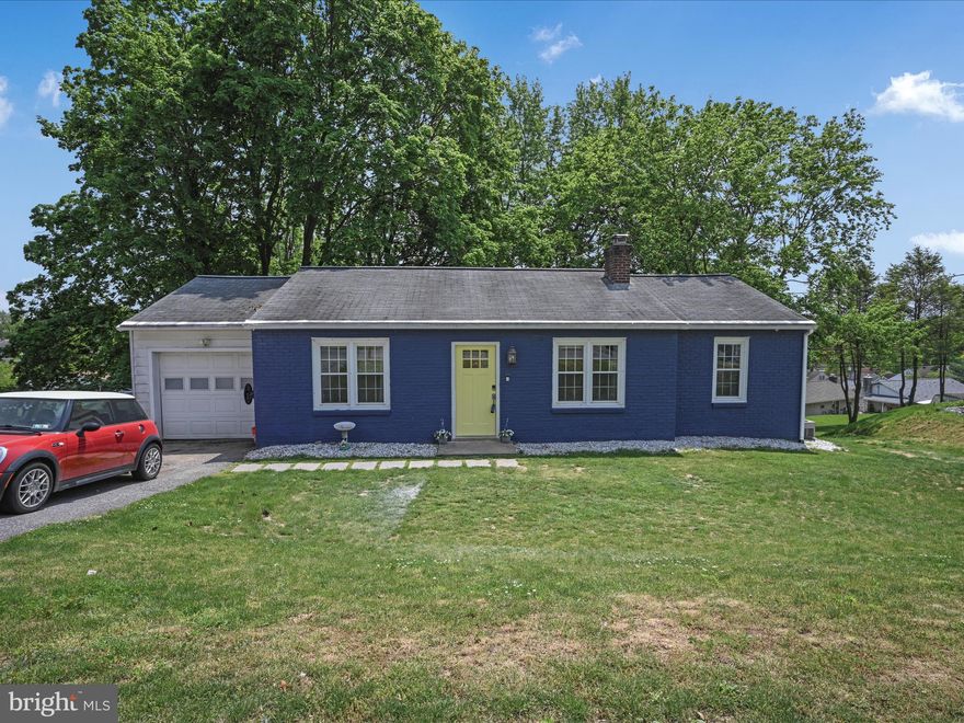 Don't let this home fool you. This home features 3-bedrooms with 2 full baths-2 bedrooms on the first level with a full bath  and 1-bedroom and 1 full bath on the lower level. There's a beautiful laundry area on the first floor which is super convenient. Enjoy dinner around the separate dining area while still able to converse with those sitting in front of the wood burning fireplace.
But wait, there's more! As you head down the winding staircase there is room for a play area/video game area or just quiet reading area. Ample storage in the closets and under the steps. You'll be thrilled when you enter the movie theatre equipped with seating for 12, a 120" screen, 17 built-in speakers, 8 ceiling, 8 surround and one center!
The cherry on top is the 2-story 14' deep x 20' wide workshop. The second story loft are is 14' deep x 12' wide! Just think of all the projects you can complete there! There is also a separate gravel parking area that is 12' wide x 40' long. Don't miss this great home! Call Today!