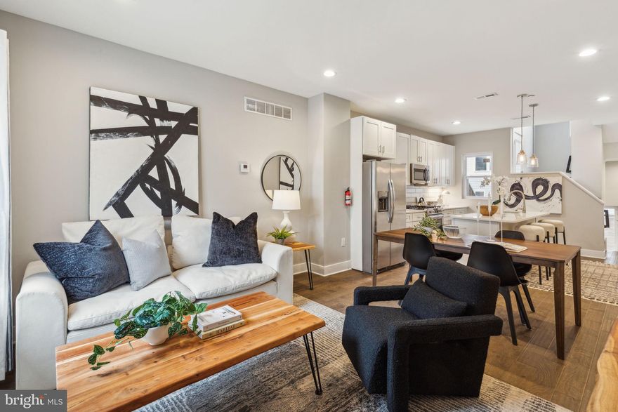 *PARKING AVAILABLE DIRECTLY ACROSS THE STREET* *5 YEARS LEFT ON FULL TAX ABATEMENT* Welcome to this beautifully maintained 4 bedroom / 3 bath home complete with roof deck and private backyard in the highly sought-after Brewerytown neighborhood of Philadelphia! Perfectly situated across from Athletic Square Park, this modern and recently built home offers easy, free, off-street parking directly across the street and boasts 5 years remaining on a full tax abatement. Step inside to a fabulous, bright, open floor plan featuring hardwood floors, tall ceilings, and abundant natural light. The contemporary kitchen is outfitted with soft-close cabinets, modern countertops & backsplash, and stainless steel appliances including a French-door refrigerator, dishwasher, range, and microwave. All 4 bedrooms are well appointed with plenty of closet space. The 3rd floor is your primary suite, complete with a bright and spacious bedroom with walk-in closet and custom spa-like bathroom with dual vanity, designer rainfall shower, and custom tilework. Also features a wet bar leading you to your expansive roof deck with panoramic Center City views—perfect for entertaining! The generously sized backyard is also ideal for outdoor gatherings. Finished basement can be enjoyed as a large bedroom or home office, with full bathroom, utility closet, and laundry room. This stunning home is situated with convenient access to walk/river trails, the Art Museum, Center City, major roadways, public transportation, and more! Just blocks from Girard Ave—home to eateries, cafes, bars, restaurants, and grocery stores. With its ideal location, luxury finishes, and rare 5-year full tax abatement until January 2030, this home is a standout in Brewerytown. Schedule your showing today!