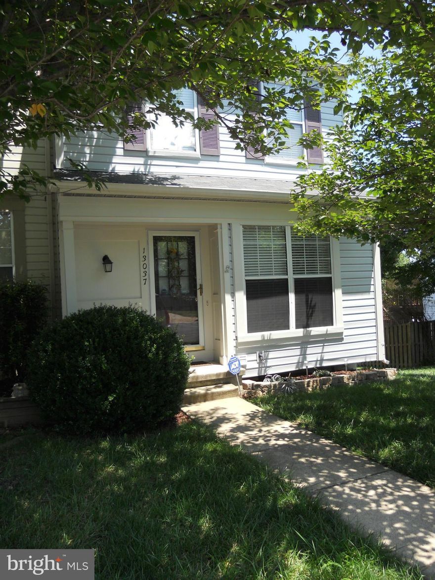 LOVELY LARGE END UNIT TH ON CUL-DE-SAC. HARDWOOD FLOORING ON MAIN LEVEL AND UPSTAIRS. EAT IN KITCHEN, DINING ROOM/LIVING ROOM COMBO, DECK BACKS TO TREES. 2 MASTER BEDROOMS W/2 MASTER BATHS. LL CERAMIC TILE, BONUS ROOM, FULL BATH, WALK OUT TO PATIO AND FULLY FENCED YARD. CLOSE TO RT 1 AND I95 FOR EASY ACCESS FOR COMMUTING AND SHOPPING.