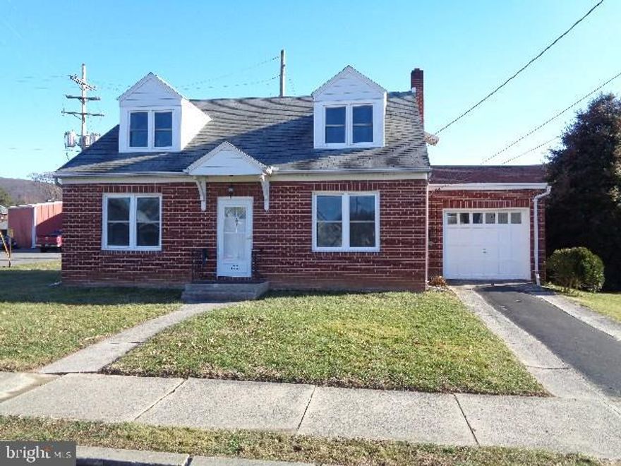 All brick home close to schools & shopping-- Many updates since purchased.  Most windows are new, interior repainted, newer carpet, newer back porch roof, remodeled bathrooms with ceramic tile, new light fixtures.  Delightful enclosed rear porch.   Move-in ready!