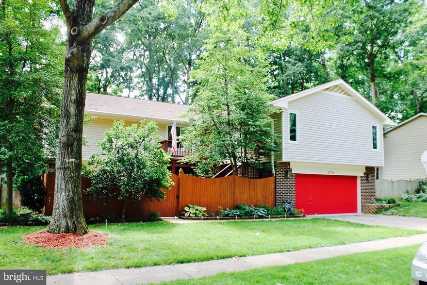 Price improvement on this magnificent jewel,  Home owner has left no stone unturned on this Impressive renovation, this amazing home displays glorious updates throughout, just recently remodeled kitchen with new kitchen island and granite countertops, top of the line stainless steel appliances, updated bathrooms, brand new gleaming hardwood floors, porcelain tiles on lower level, new recessing lights in bot levels, brand new office space, 2 beautiful fireplaces w/ granite and Italian porcelain tiles, Energy efficient double panel Windows, newer water heater and HVAC, Oversized living & family room. This home sits on a Large flat lot with beautiful views to the golf course and fence all around for privacy, Front patio, 2 large oversized car garages, Amenities included are Beach lake access,  playgrounds, Parks,  outdoor Pools and Golf course membership available, Close to I95/ Quantico