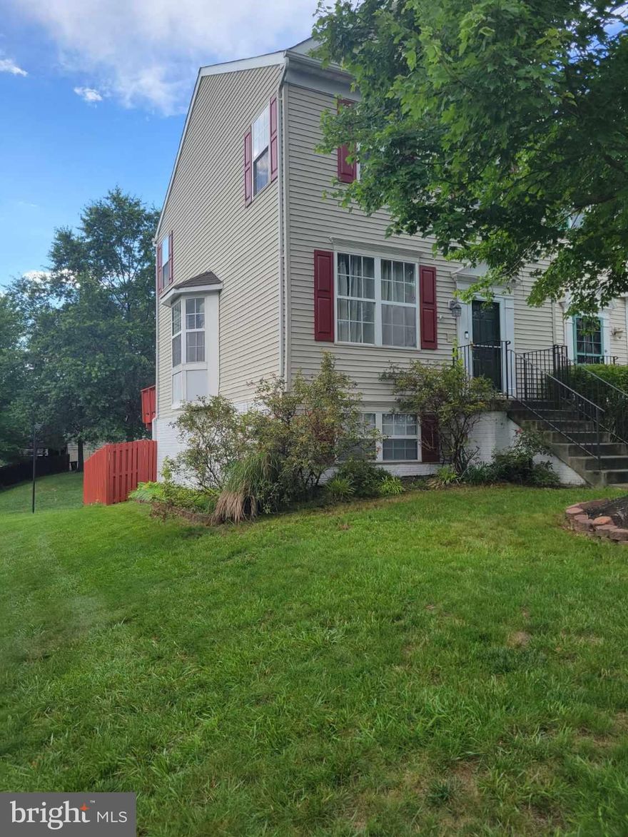 Welcome Home to 7014 Onyx Court, your spacious 4 bedroom, 2.5 bath townhome perfect for entertaining awaits you! Conveniently located near all major highways, bus & rail stations and minutes away from Washington, DC within the lovely Yorkshire Knolls Community.

7014 Onyx Court is a well maintained end unit townhome with beautiful wood flooring, an eat in kitchen that opens up to a recently refinished deck- perfect for entertaining! The upstairs includes three bedrooms along with a full bath and ensuite within the primary bedroom. The basement includes an additional bedroom room that can be easily utilized as an office, gym, craft room or play area! The basement includes  another open area for entertaining that opens up to an enclosed large yard. 7014 Onyx Court has a brand new roof which is less than 6 months old which will give any 1st time homebuyer a peace of mind!