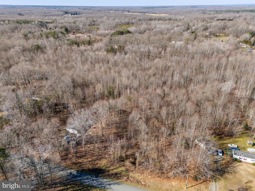 Large 3.37 Acre lot. Mostly wooded with road frontage.