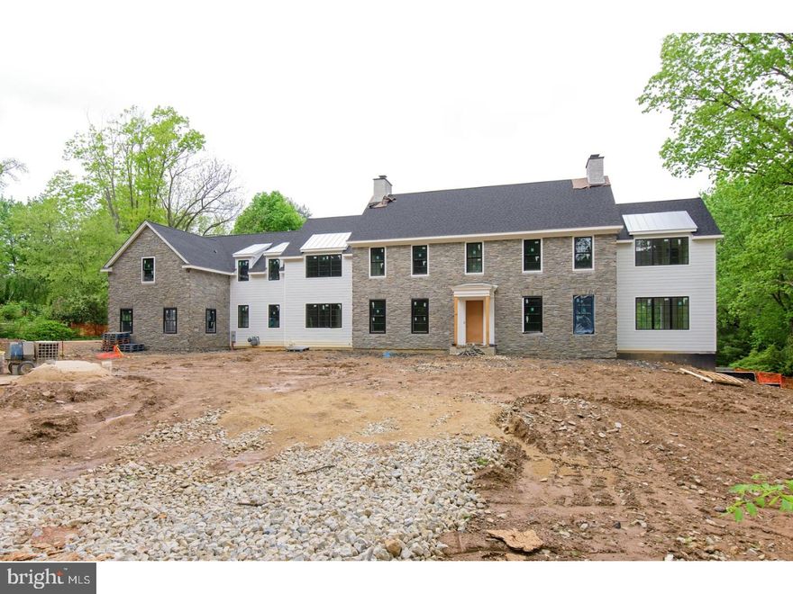 From Waverly Custom Homes: all new, high end construction, superior craftsmanship, premium finishes and materials, and uncompromising attention to detail define this magnificent home. Edited in 1.5 mature acres on one of the most desirable addresses in the heart of Philadelphia's Main Line. Exceptional living for active family life and entertaining. Dramatic 2-story entrance opens on one side to large dining room with fireplace, butler's pantry, and into a spacious kitchen with 7-seat central island as focal gathering point, premium appliances and ample counter space. Off kitchen is a large well fenestrated family room with fireplace, and breakfast room. An office/study, mudroom and back staircase complete this area. Opposite, a large living room to sunroom, both with fireplaces for optimal seasonal enjoyment. A library/study offers quiet work space. On second level, a central hallway opens to sitting area and master suite appointed with his and hers dressing area, closets and shared baths. 3 additional bedrooms with en-suite baths, a spacious guest suite with sitting area and bath, and second floor laundry complete this level.A full finished basement offers a yoga room with outside access, exercise room, wine cellar, 6-seat wet bar, family room, 13-seat movie theater and card game room.  Optional elevator bank, 3- car garage with additional courtyard parking complete this stately residence. Traditional in design, yet modern and elegant, this beautiful home awaits only your custom finishing touches.  Finished Basement is not included in the base price of the house.