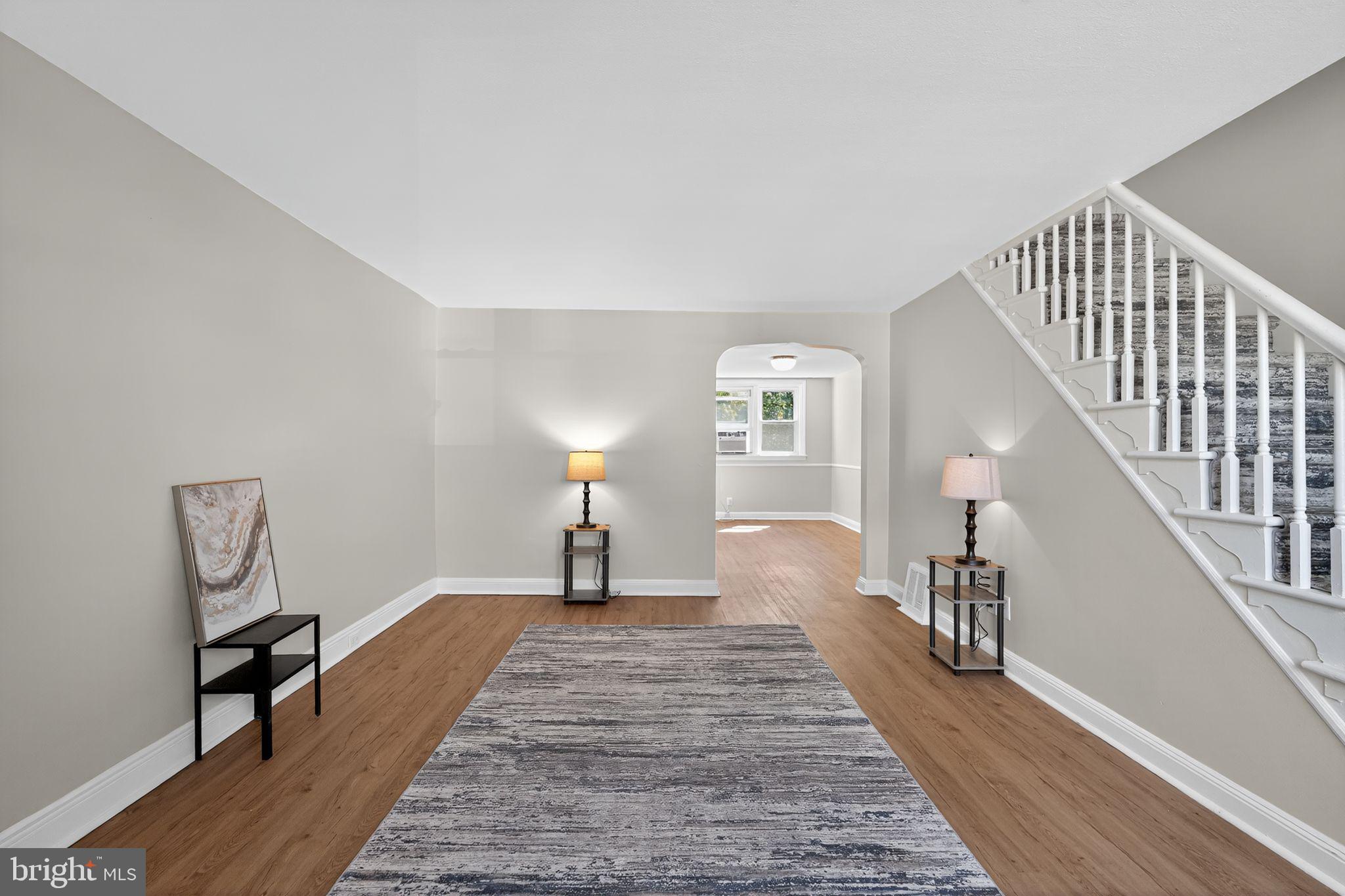 Welcome to 205 W 22nd street in Chester. This 3 BDRM 1 bath townhouse has been updated t/o and is looking for it's next owner. The property is w/in minutes of Widener University, I 95 corridor, Brookhaven shopping, and public transportation making the location ultra convenient. The exterior has a NEW private patio in front and rear parking w/ interior access to the basement. The sun-filled first floor boasts beautiful luxury plank vinyl floors, neutral paint, and an ultra modern opened kitchen w/ ample cabinet and counter space. The kitchen includes a convenient butcher block breakfast bar w/ additional cabinets, beautiful tiled flooring and backsplash, and Corian counters. The second floor has 3 bedrooms with a generously sized owner's bedroom and an updated hall bath w/ glazed tiled surround and new vanity. The basement is semi-finished adding additional living space, has storage, and a laundry area. Some additional amenities include replacement windows, a new roof, and gas cooking. The current owner's spared no expense in making this house a home for the next owner to enjoy!