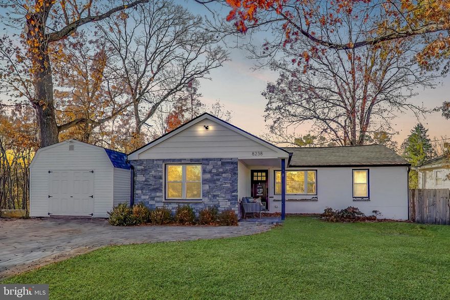 Welcome to a home that has it all!   Step inside to a bright, open living area featuring hardwood floors, vaulted ceilings, and recessed lighting—plus a versatile space perfect for a home office.  The beautiful kitchen, remodeled in 2020, boasts granite countertops, stainless steel appliances, a walk-in pantry, and a spacious dining area that’s ideal for gatherings or everyday meals. Down the hall, the large primary bedroom offers a ceiling fan, recessed lighting, and a remodeled full bath. Two additional bedrooms with generous closet space and another updated full bathroom complete the main level.  The finished lower level includes a recreation room with recessed lighting, a huge storage closet, and a convenient utility/laundry area.  Outside, enjoy a covered front porch, a wonderful backyard with a storage shed, and a new 12x20 shed with electricity and it's own heat & A/C located in the front yard.  Additional updates completed in 2020 include a new roof, new windows, and an upgraded HVAC system. The extended driveway provides plenty of off-street parking, and the .26-acre lot offers a peaceful setting backing to the woods.  Ideally located near Fort Meade and major commuter routes to Baltimore and Washington, DC, plus it's a short drive to the Odenton MARC Station and even BWI airport!  You can purchase this home with confidence; a one-year First American Warranty is offered!