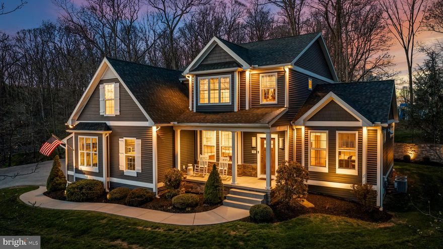 Welcome Home to 95 Shady Lane! This incredible craftsman inspired home was designed and built for the builder himself and has been impeccably maintained along with a giant upgrade list. As you enter, you'll be greeted by 9' ceilings and hickory wide plank hardwoods throughout most of the first floor. You'll pass by dining, an office, and spare bedroom before entering into the wide open living room and kitchen with walls of windows allowing for tons of natural light. Living room and office has custom built ins. Upscale kitchen has dove tail soft close drawers, farm sink, under-cabinet lighting, quartzite countertops, and stainless steel appliances. Upstairs you'll find 9' ceilings as well with an owners suite that was designed with comfort in mind boasting a soaking tub, ceramic tile shower with a rain head, and double vanities. The other bedrooms are very spacious providing your family plenty of room to spread out. The bonus bedroom above the garage allows for flexibility as a playroom, bonus living space with stairs to the additional garage. The lower level is finished as well allowing for more living space and a gym. Mudroom offers a dog washing station. Oversized 5 car garage with insulated steel backed doors gives you all the garage space you could need and provides access to the bonus bedroom above the garage. On the patio outback, surrounding low voltage lighting sets the tone for evening gatherings. Propane line plumbed into the patio for convenience. Positioned close to all major conveniences and commuter routes, this home is not one you want to miss! Schedule your private tour today!