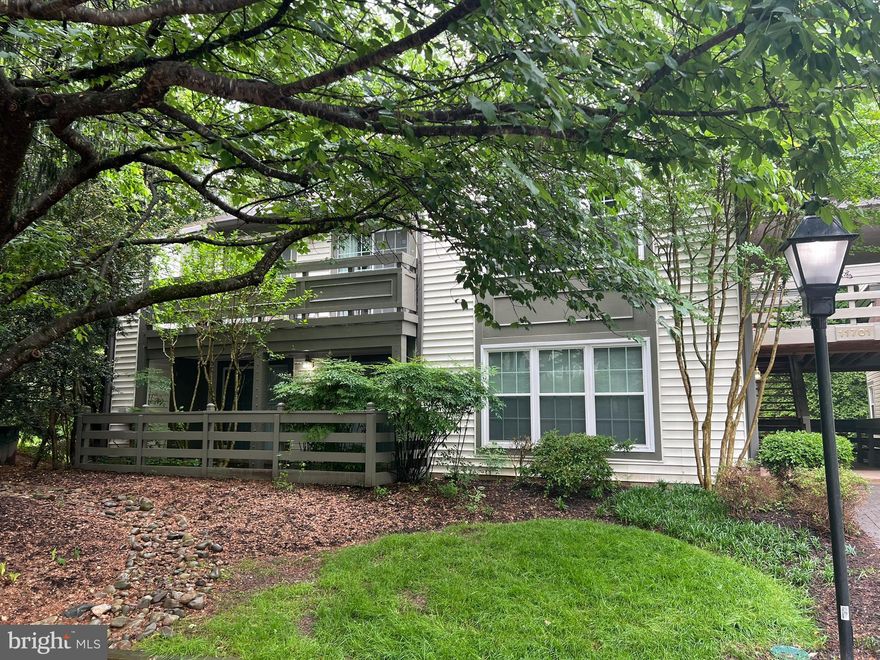 Welcome to this wonderful 2 bedroom, 2 bath, ground level condo in the heart of Reston. This building and condo is at the end of the road with no traffic passing by. As you enter the home, you notice that the floor has been upgraded and used very lightly. This home is very clean and original and awaiting your style and design ideas to transform it into the home you envision. The family room is spacious and features a fireplace and open to the kitchen and dining area. There is a door leading to a large, covered patio that is also accessible from both bedrooms. This is a wonderful place to sit and relax and enjoy the outdoors in the warmer months. There is an in-unit washer and dryer for your convenience too. The condo is pet-friendly and also conveys with 1 assigned parking spot, #99 which is steps from your front door. There is plenty of guest parking too in the community, and very close to this home. There are also tennis courts near by for your enjoyment along with pools, recreational facilities and all the Reston association has to offer. This home is also minutes from major commuting routes, 267, 66, Reston Parkway, the Reston Town Center, shopping, restaurants, grocery stores and many other conveniences. Welcome home!