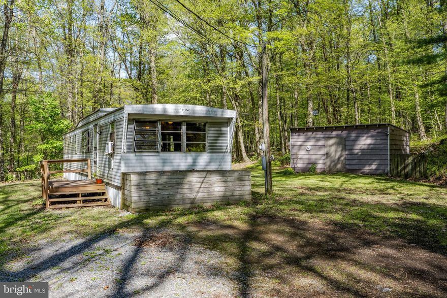 AUCTION DATE - MONDAY, JUNE 8, 2026, AT 5 PM. LISTED PRICE IS AN OPENING BID ONLY AND IS NOT INDICATIVE OF THE FINAL SALE PRICE. REAL ESTATE: 1528 Hilltop Rd., Mohnton: Country 12x70 manufactured dwl. w/840 SF finished area, eat-in kitchen w/appliances, pantry, living rm., 2 bdrms., full bath, (2) decks, utility bldg. 19x12 all on 2 ACRES, partially wooded. On-site well & septic system. NOTE: Both properties are adjacent to each other, both deeded separately & will be sold separately. Quiet, wooded & dandy setting w/abundant wildlife. Ideal as residence or investment. Terms 10% down, balance 60 days or before. Personal inspection by appointment or open house Sat., May 23, 30 & June 6 from 1 to 4 PM.