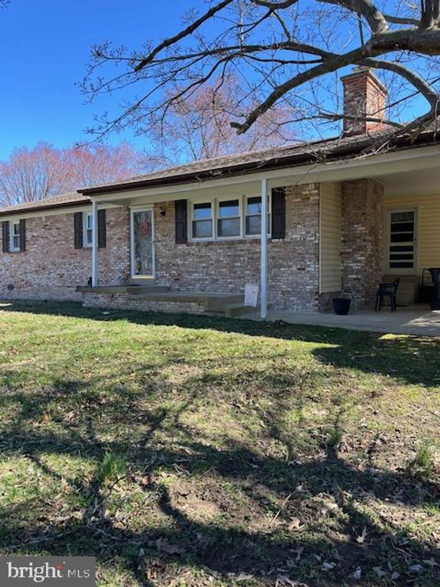 This 3 bedroom, 2 bathroom brick front charming rambler has a great room that measures 20'X30' with wood burning stove along with formal living room with wood fireplace , formal dining room and eat in kitchen.   A brand new stainless steel dishwasher installed in kitchen.  Large detached 2 car garage with electric and separate door entrance.  Plenty of parking available, driveway, 2 car detached garage and carport.  Short drive from shopping, dining and major commuter routes.