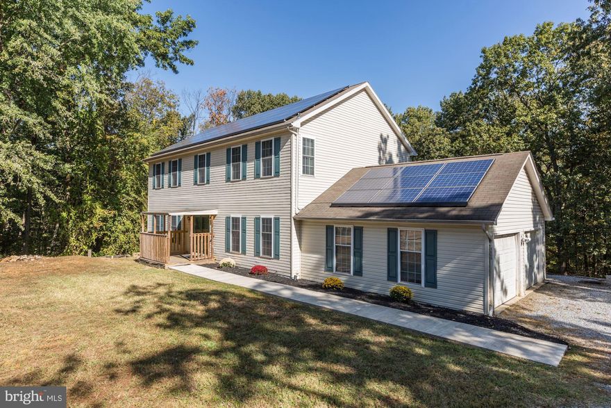 TEMPORARILY OFF MARKET.  Price reduced. NO FRI EVENINGS AFTER 5:30 OR SATURDAY SHOWINGS. Proudly come home to your 4 BR/3   bath, 4,000 s.f. Colonial style home on 3 finished levels handsomely sitting on 2, that s right, TWO, heavily wooded private, exclusive acres in near Old Bowie giving you the scenery, wildlife, natural beauty, and ambience of a national park on an exclusive, quiet, dead end street, with your tree filled acreage nearly adjoining and within a few feet of beautiful but little used Huntington North City Park (see pics and map) with its ball field, children s playground, basketball and tennis courts. The handful of neighbors living on this short street have a Neighborhood Watch program to give you added security.  Watch your utility bills plunge with use of your Earth and pocketbook friendly rooftop solar panel system. Entertain your guests on the main level with a huge center island kitchen with, not one, but TWO gas burning stoves that will allow you to proudly cater to a houseful of guests. Large bedrooms and high ceilings on all levels with a cozy and romantic raised hearth fireplace in the master bedroom give this home a large, open sense of spaciousness and room to relax and entertain.  Speaking of entertaining, throw a party or relax with your guests and family in your huge, carpeted, family/rec room on the lower level which is bathed with lots of natural light and  opens onto the rear yard at grade.  A roomy storage shed allows you to keep your attached, 2 car garage tool, equipment, and clutter free.  To give you confidence, this motivated seller has gone the unusual, almost unheard-of extra mile in providing you with (1) a 7-31-2019 professional home inspection report which showed just a handful of items which have ALL been fixed, AND, (2) an 8-28-2019 professional pre-listing appraisal report on which the below appraisal price is based. Disclaimer:  Some of the photos of this listing have been virtually staged.  Attached to this listing:  disclosures, appraisal, annotated inspection report, survey, plat map.  Closing must be at TurnKey Title - Bowie/Crofton.