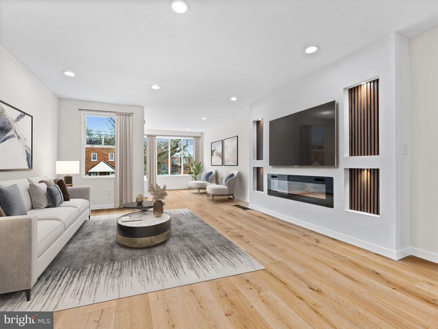 Modern Elegance Awaits at 1519 67th Avenue, West Oak Lane! Step into unparalleled style and comfort at this meticulously renovated 3-bedroom, 2.5-bathroom home in the heart of West Oak Lane. From the moment you enter, you'll be captivated by the seamless open-concept design, where newly installed hardwood floors and recessed lighting create a bright, inviting atmosphere. The living area is anchored by a striking accent-lighted fireplace wall, radiating warmth and sophistication. A charming bay window bathes the space in natural light, highlighting the exquisite details throughout. Prepare to be wowed by the brand-new kitchen, a chef's dream featuring a sophisticated blend of white and oak soft-close shaker cabinets, stunning quartz countertops, a pristine white subway tile backsplash, and gleaming stainless steel appliances. Ascend to the second floor and discover a luxurious master suite, boasting a modern private bath and generous closet space. Two additional spacious bedrooms share a beautifully appointed, brand-new hall bathroom, ensuring comfort for all. The finished basement expands your living and entertainment options, showcasing a trendy panel and tiled accent wall and a sleek, modern powder room. This versatile space is perfect for hosting gatherings or creating a personalized retreat. Seamlessly transition from indoor to outdoor living with direct access to your private one-car garage and a fantastic outdoor deck, ideal for summer barbecues and entertaining. This meticulously renovated West Oak Lane gem is move-in ready, offering the perfect blend of modern amenities and classic charm. Don't miss your chance to call 1519 67th Avenue home!