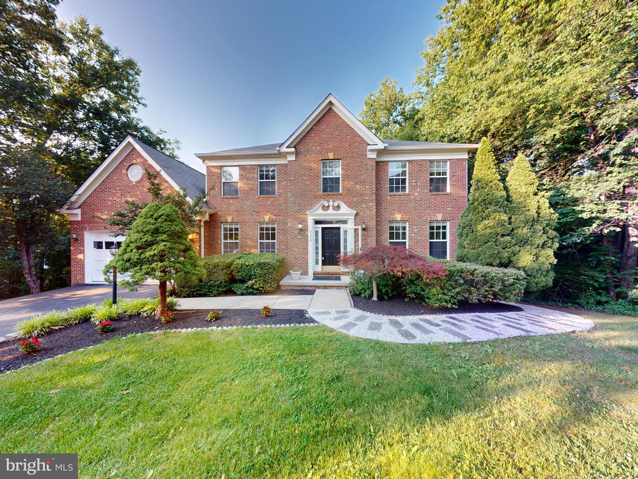 Welcome to 1379 Dominion Ridge Ln—a stunning 5-bedroom, 3.5-bath all-brick colonial nestled on a corner lot in a peaceful cul-de-sac within the desirable Dominion Ridge community. Boasting over 4,000 sq ft of well-designed living space, this beautifully maintained home offers both comfort and functionality. The main level features gleaming hardwood floors, a spacious kitchen that opens into a sun-filled family room with a cozy fireplace, and large windows that bring in an abundance of natural light. Upstairs, generously sized bedrooms provide ample space for relaxation, while the walk-out basement is ideal for extended living or guests with a large 5th bedroom, full bath, kitchenette, and two versatile living areas. Step outside to a serene, fenced backyard perfect for entertaining or enjoying quiet moments on the brick patio or screened-in porch—ideal for morning coffee or evening gatherings. The home also includes a 2-car front-facing garage with extra storage options. Pet lovers rejoice—this home welcomes your furry companions with no breed restrictions and allowance for multiple pets. Enjoy the convenience of being just minutes from Herndon’s charming downtown, local shops, trails, and the vibrant Reston Town Center. This is more than a home—it’s a lifestyle.