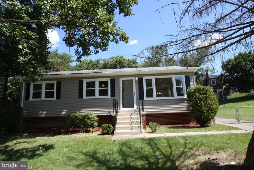 WOW!! GORGEOUS!! completely remodeled from top to bottom, new kitchen w granite counter top and back splash, a brand new deck,new hardware, new electrical fixtures newer windows, New paint on the whole house, inside and out, makes it shine like new Basement 2 more bedrooms/Dens,  Within minutes from Andrews AFB, MGM, National Harbor, shopping and restaurants!!, Come and see this beauty.