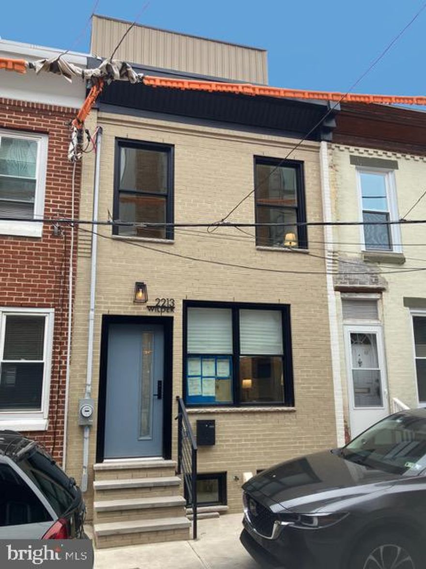 Welcome home to 2213 Wilder Street in the heart of Philadelphia's vibrant Point Breeze neighborhood!
 
Stunning, custom renovated, classic brick-front rowhome featuring four bedrooms and two full baths. Spacious open living room with fireplace, recessed lighting, and dining area. Modern kitchen with ample 2-tone cabinets, quartz counters, roll-out pantry shelves, 4-drawer refrigerator, & charging outlets. Beautiful hardwoods & plenty of natural light throughout. Private fenced patio/backyard for relaxation, BBQ and gardening. Finished basement rounds out the lower level with new flooring, laundry, storage and mechanicals. The second level offers two bedrooms, linen closet, and a bathroom featuring sconce lighting, medicine cabinets, & built-in bluetooth lighting/fan. The third level houses the primary bedroom, bathroom with glass/tile shower (rain head & massage sprayers), walk-in closet with custom hardware, and additional fourth bedroom/office/nursery. 

Walk out your front door to a truly exceptional urban lifestyle. Steps to Wharton Square Park, local favorites American Sardine Bar, Chick’s, Dock Street Brewery. Only a few blocks to the Washington Avenue retail & restaurant corridor - Aldi’s, CVS, Planet Fitness and so much more! Easy access to the Schuylkill River Trail, Penn/Chop/HUP & the South Street Bridge/I-76 expressway. 

A true gem! Move right-in!