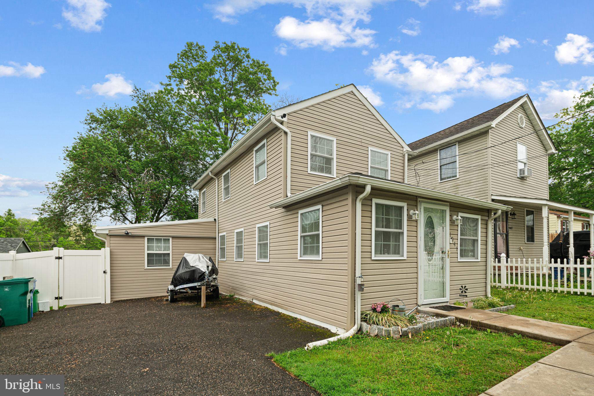 Unique double-lot opportunity with major upside—cash buyers only!
***NOTE: This is a cash-only, as-is sale. Buyer is responsible for any U&O requirements and all due diligence. The home has known foundation issues that will require professional repair. A new grinder pump has been installed and connected to the public sewer line (and inspected/approved by the township), but still needs to be powered and connected to the house inlet.***
Situated on a rare double lot in Croydon, this spacious home offers a prime opportunity for investors or cash buyers seeking a value-add project with serious potential.
Step inside through the enclosed front entry—perfect as a sunny mudroom or bonus workspace—and into the main living area, where hardwood floors and natural light create a cheerful, welcoming atmosphere. The open-concept flow leads through a central dining area and into a thoughtfully designed kitchen with cherry cabinetry, stainless steel appliances, a breakfast bar, and plenty of storage.
Toward the back of the home, a convenient powder room sits just off the kitchen, along with a full laundry area and bonus storage—perfect for keeping daily routines organized and out of sight. A spacious first-floor primary bedroom with an en-suite bath adds flexibility and ease for single-floor living.
Upstairs, three additional bedrooms share an updated full bath with a walk-in shower. Each bedroom is well-proportioned and filled with natural light, offering flexibility for guests, family, or home office use.
Outside, the fully fenced yard stretches across both lots—offering a quarter acre of outdoor space for entertaining, future expansion, or added amenities. A vinyl privacy fence, large shed, and extended driveway with space for 5+ vehicles are already in place.
Located minutes from Neshaminy State Park, the Delaware River, Neshaminy Creek Brewing Co., and major routes including I-95 and the Burlington-Bristol Bridge, this property offers a rare combination of lot size, layout, and long-term potential. Schedule your showing now before it is too late!