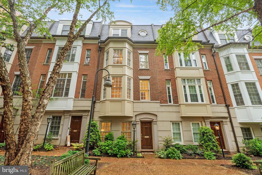 Rarely available townhome in coveted City Homes of Edgemoor in the heart of Bethesda! Ideally situated just 1 block from restaurants, shops, Metro, and all that Downtown Bethesda has to offer! This home offers four levels of living and entertaining space, perfectly combining luxury and comfort. The first floor features a courtyard-facing home office or exercise room, a powder room, and a convenient 2-car garage. Head upstairs to the sunny, open-floor plan main level with gleaming hardwood floors and 10’ ceilings. The eat-in kitchen, with gas fireplace and counter seating, features freshly painted cabinets with new hardware, as well as a sliding glass door leading to a balcony. The kitchen flows effortlessly into the dining and living area featuring a wall of windows overlooking the charming courtyard. Upstairs, discover a large primary bedroom suite with walk-in closet, an additional bedroom that could be used as a second office or nursery, and conveniently located laundry. Two additional bedrooms, each with an ensuite bath, complete the home. Don’t miss this opportunity to live in the center of it all!