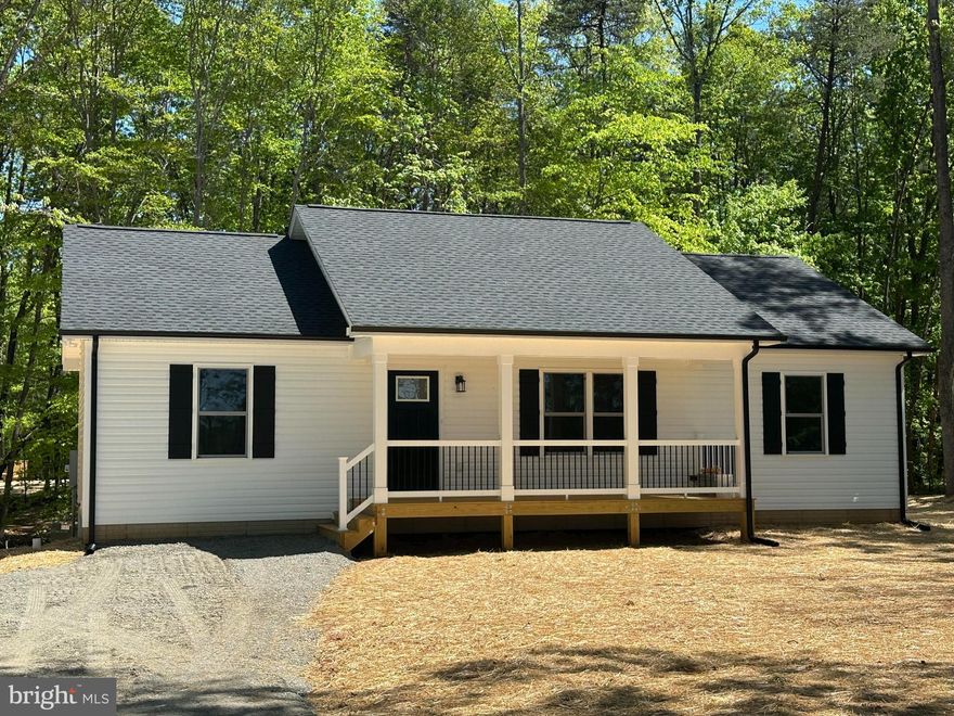 Beautiful Rambler Tucked Away on 2 Acres -  Just Completed and ready for you! Open floor plan with vaulted ceiling in the Kitchen/Dining/Great Room area of the home.  Rich LVP flooring throughout the entire home.  Kitchen displays a large granite center island, gleaming white cabinetry, stainless steel appliances and double sink.  Primary Suite complete with walk-in closet and full bath with double vanity.  Two additional spacious Bedrooms balance out the opposite end of the home.  Both baths offer granite countertops tub/shower combos. Thoughtfully designed utility room offers pantry, coat/storage closet and ample room for a full-sized washer and dryer. Sit for a bit on the covered front porch, adorned with metal pickets and easy to maintain vinyl railings.  Relax on the rear deck or invite your friends/family for a backyard BBQ - plenty of space to enjoy! The black gutters/downspouts, shutters and door really make this charming home pop!!