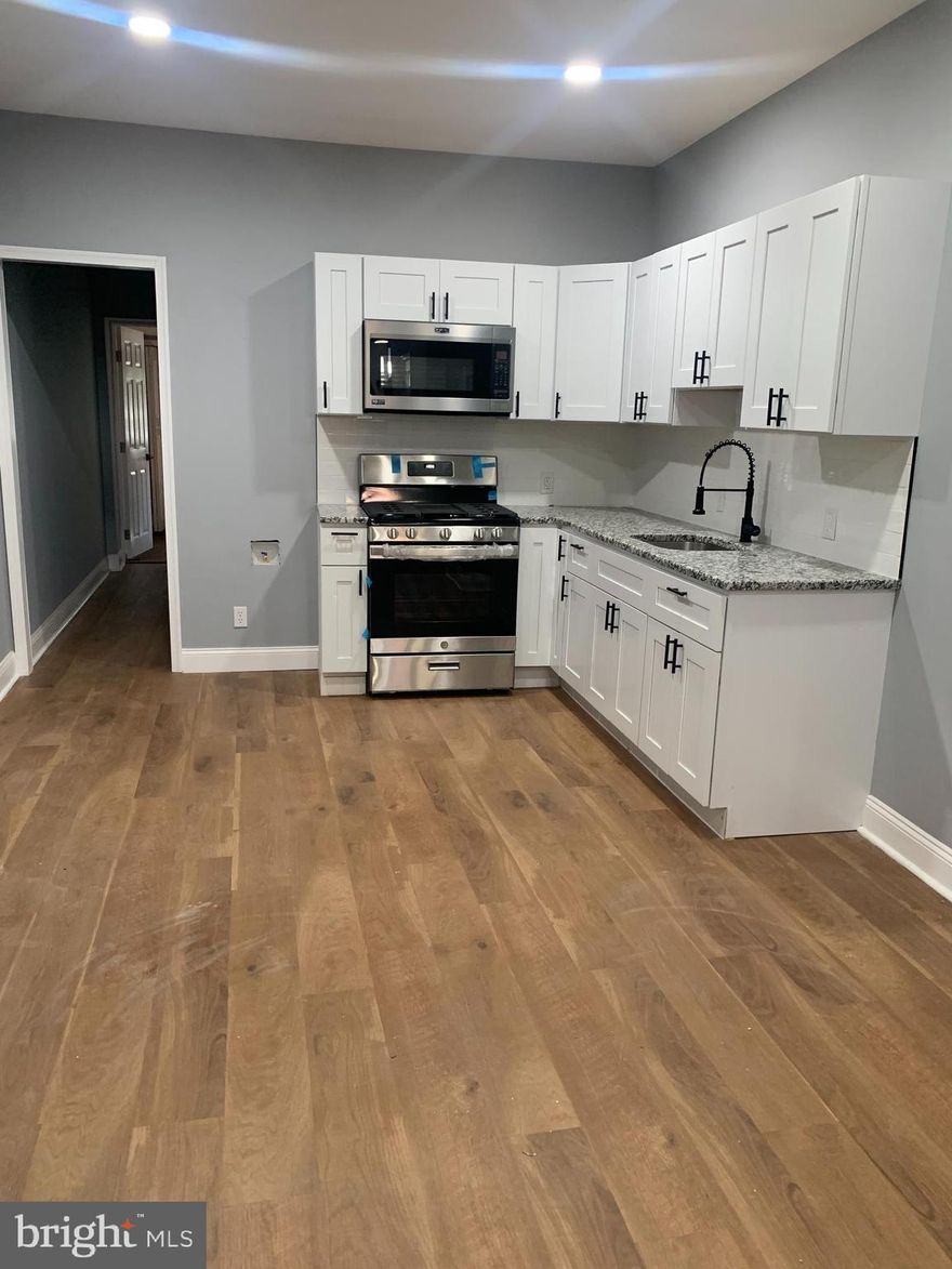 Ready, fully updated 2 bedroom 1 bath unit with laundry.  Spacious and in a great location.