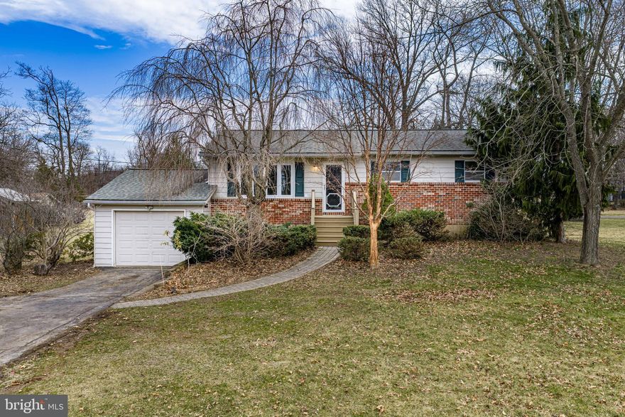 Highest & Best due Monday, March 16 by 5pm. Welcome to 6527 Walnut Lane in Coopersburg, Pennsylvania, a warm and inviting 3-bedroom ranch home in Upper Saucon Township that offers comfortable single-floor living with additional space for relaxing and entertaining. Located on a quiet residential street, this charming home is perfect for first-time homebuyers or families looking for a cozy place to settle in the Southern Lehigh School District. Step inside and you are welcomed by a bright, sun-filled living room and beautiful new flooring throughout, creating a fresh and inviting feel from the moment you enter. Large front windows fill the space with natural light, making it easy to imagine relaxing evenings with family or gathering with friends. The kitchen features granite countertops, stainless steel appliances, and ample cabinetry, providing a practical and welcoming space for preparing meals. Just off the kitchen is the dining area with sliding glass doors that open to the rear deck, perfect for enjoying morning coffee, summer barbecues, or quiet evenings overlooking the backyard. The main level offers three comfortable bedrooms and a full bathroom, creating a functional layout for families, guests, or even a home office. The finished lower level adds valuable living space, bringing the home to approximately 1,700 square feet of finished living area in total. This spacious recreation room features exposed wood beams and a cozy propane fireplace, creating the perfect setting for movie nights, game days, or a playroom. The lower level also includes a convenient half bathroom, a dedicated laundry room, and interior access to the one-car garage, and door to the backyard, making everyday living easy and practical. Outside, the rear deck overlooks the backyard, offering a great place for relaxing evenings or entertaining guests. The property also includes a storage shed, providing plenty of space for tools, lawn equipment, or hobbies. Conveniently located just minutes from Route 309, I-78, and the Promenade Shops at Saucon Valley, this home offers easy access to shopping, dining, parks, and commuter routes while still enjoying the peaceful feel of a neighborhood setting. If you have been searching for a welcoming home in Coopersburg and Upper Saucon Township, this charming ranch is ready for its next owners to move in and start making memories.