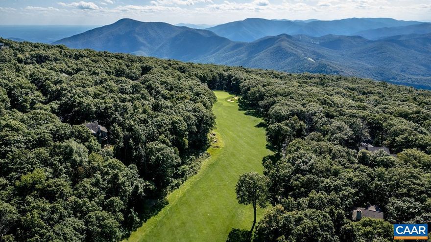 The roads to the site and all utilities are ready for a new dwelling. The lot is located to the left of the 13th tee of the Devils Knob course and a short walk to major facilities of the Devils Knob complex.  This is a unique listing in which a 2nd home once stood on this site but was consumed by a fire several years ago and the lot was reclaimed. The good news is that all the necessary utility hookups are at the lot waiting to be connected to a new dwelling.