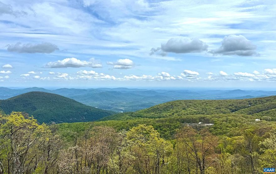 Experience mountain living at its finest with this beautifully updated condo offering spectacular mountain and valley views and breathtaking sunrises.�This two-level floor plan features a master suite on each level. The lower level master is expansive and includes a walk-in closet, a luxurious bathroom, a private walk-out deck, a sitting area, and a wood-burning fireplace for cozy mountain evenings. On the main level, you?ll find an open and bright floor plan with a wall of glass to showcase the magnificent views. The chef?s kitchen is a dream, with custom maple cabinetry, elevated granite countertops, and an induction cooktop, all opening seamlessly to the dining area and living room, where a stunning stone wood-burning fireplace adds rustic elegance. Step outside to the large Trex deck with stainless steel cable railings ? the perfect spot for outdoor dining or simply taking in the panoramic scenery. The current owner has lovingly updated the entire interior with thoughtful, high-end upgrades, including: New HVAC system, Sound-deadening insulation in the main level ceiling, Upgraded and creative accent lighting throughout, Radiant heated floors in all bathrooms, Central vacuum system, And much more. Centrally located. Furnished,Glass Front Cabinets,Granite Counter,Maple Cabinets,Painted Cabinets,Wood Cabinets,Fireplace in Living Room,Fireplace in Master Bedroom