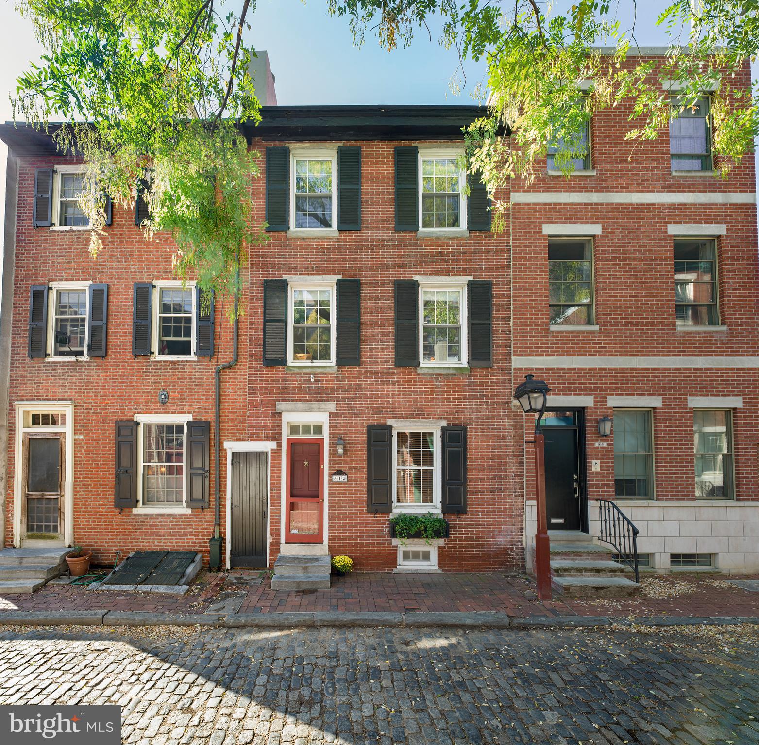 Beautiful 3-Story Brick Townhouse located on one of the few remaining Cobblestone Streets in the heart of Society Hill. This peaceful and quiet Home features 3 Bedrooms, 2.5 Baths, Gorgeous Wood Floors, and Sun-lit interiors throughout. The 1st floor welcomes you to an open living room and a custom cook s kitchen with a wood-burning fireplace that leads to a magnificent private garden. The 2nd Floor has a large front facing bedroom overlooking Cypress Street, and a second bedroom. The 3rd Floor is the Master suite with a study and a gorgeous Master bath. Additionally, there is a wonderful large skylight that provides great natural light on the 3rd floor. There is a finished basement currently used as a media room.