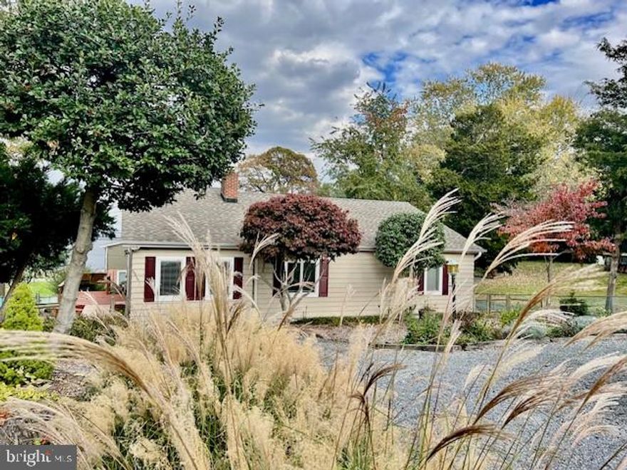 Peaceful home in Bay Ridge community with "WATER VIEW" This charming 1953 Cottage has a warm and inviting atmosphere was just freshly painted and was renovated in  2010, Wood floors, Granite counters, stone FP, Fantastic owner suite with water view's /Steam shower/soak tub , less then 100 yards to Comm Beach! 
The open-concept living area features lots of windows, allowing natural light to flood in. Step outside onto the spacious deck where you can bask in the sunshine, relax, and take in the beautiful waterview's. The Best Water access in AA County, Great for Entertaining, Comm amenities Incl, Beaches, Pool & Clubhouse, Marina & clubhouse, Ramp, Mooring area, Playground, Basketball/Roller Hockey Courts, Ballfield, miles of beautiful walking waterview's come home and relax.