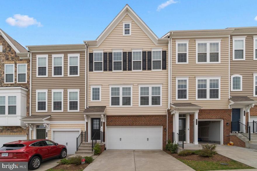 This beautiful 4-year young townhouse features a stunning large gourmet kitchen and 3 levels of outdoor deck space. Upstairs are 3 bedrooms, 2 full baths, plus an additional full bath in the basement.  2 car garage plus additional overflow parking. Just over a mile from One Loudoun, this quiet enclave of homes is a hidden treasure in Loudoun County with Broad Run Creek and the Potomac just a stone's throw away.  Don't miss this gorgeous home.