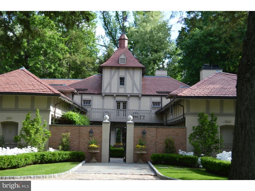 This historic carriage house has been tastefully renovated including the state of the art kitchen, the creation of the contiguous family room. It is now a most comfortable, inviting & unique home--truly one of a kind. The tan/off white Tudor board and stucco exterior is crowned by stunning Vermont red slate which creates prominent lines & bold symmetry. Three sides of the home embrace an elegantly planted, peaceful, walled and gated large courtyard. The interior first floor is an open floor plan. The living room, dining room, family room and library surround the courtyard and are flooded with light. The oversized, paneled study has a wall of windows overlooking the pond. Marble floors, beamed ceilings, oak flooring, high ceilings, tons of windows, gorgeous kitchen, four gas fireplaces, original arched carriage windows, an imported Italian antique mantle and many other amenities will delight you. Each of the five/six bedrooms opens from a gallery hallway, including the luxurious master Bedroom suite with his & her Baths and dressing rooms. The home is nestled on an acre of lovely grounds with a pond and stream. All on one of the Main Line's most prestigious neighborhoods, the Cheswold Community.  Owners are PA Licensed Real Estate Agents. HomeJab video   https://homejab./#!/property/view/151-cheswold-valley-rd-haverford-pa-19041-usa    Add .com after HomeJab -Highlight - right click