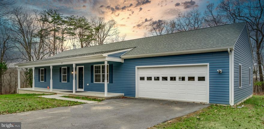 Come on home to Beautiful Harpers Ferry.  This home has lots of upgrades, and an Open Floor Plan.  Kitchen and Bathrooms have Granite Countertops.  Soft close doors on all the cabinets, Slide out drawers  in the kitchen pantry, New Black Slate Stainless Steel  Appliances.  Community has an optional Club House with Pool and the river Access.  Home is wired with dual cat6 and rg6 outlets.  2 ethernet and two cable plugs in every room.  Comcast internet is available.  Basement has 9 foot ceilings with a wood burning fireplace. Full water softener, reverse osmosis and uv filter system.   Large Garage, 24x28,  with pull down Attic for extra storage.  Lot is .96 acres with beautiful mountain views.   New  Deck  to enjoy those summer evenings while cooking out.  Must See!!