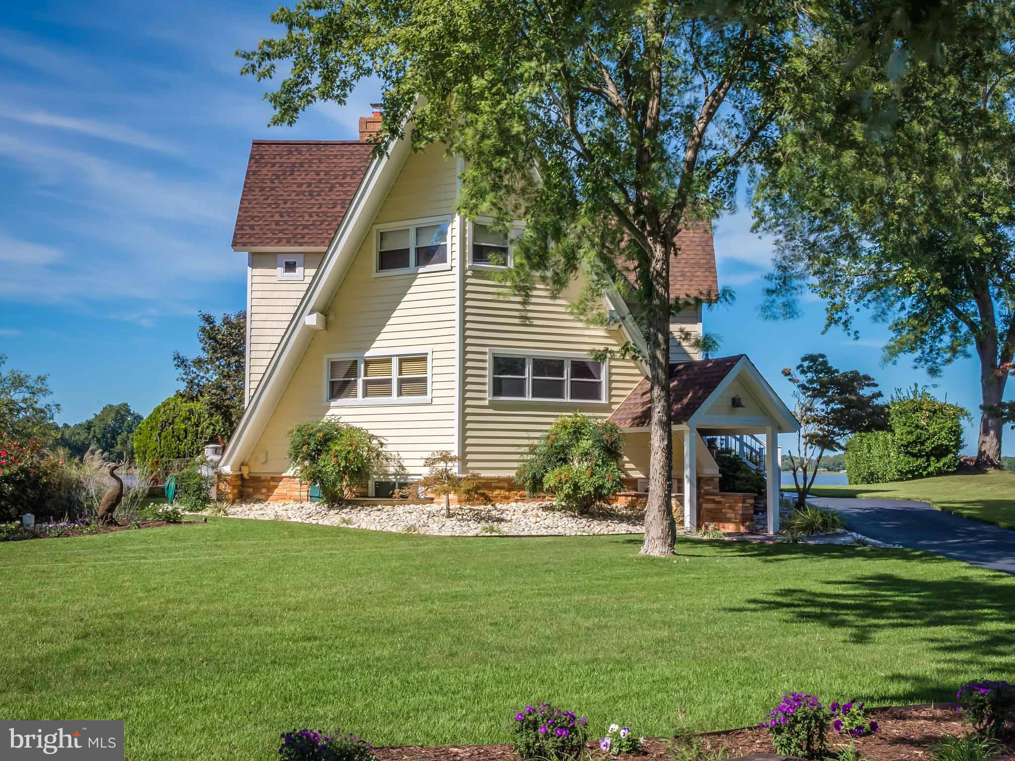Exquisite reconstructed waterfront w/over 3400 sqft Sep.wine rm,chefs kitchen,master suite w/cathedral,beamed ceiling & private balcony w/views,ma/bath w/fireplace.New septic, well,roof w/life time warranty,geothermal & electric air filter,insulated siding,spray foam insulation,pilings & pier,permitted in-law suite, detached 2 car gar. covered boat slip, covered concrete stamped patio w/waterview