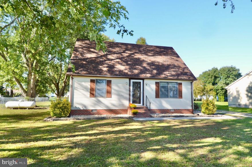Cute as a button Cape Cod in Princess Anne!  Move-in ready with over 1,300 square feet.  This home is a great opportunity in today's market.  The home has 3 bedrooms and 1 full bath and offers a number of upgrades within the last few years, including vinyl plank flooring, new paint, painted cabinets, and a bathroom update.  As you enter the home, you will be welcomed by a cozy living room.  The eat-in kitchen is to the rear of the home and the hall to the left will lead you to the two first floor bedrooms and the full bath.  Upstairs is the third bedroom and a flex space that offers great potential for a future 4th bedroom, 2nd bath, office, game room or any number of other uses.  The outside doesn't disappoint either.  The landscaping beds are stone for lower maintenance.  There is an expansive wrap-around deck that begs to be used for BBQ's and entertaining.  And a sizable area within the rear yard is already fenced in for you and your pets to enjoy.  While conveniently located close to the amenities of Princess Anne, historic Deal Island is less than 20 minutes away and Ocean City, Assateague and Chincoteague are all less than an hour away.  Opportunities abound for outdoor recreation and enjoying all that the Eastern Shore of Maryland has to offer.  Schedule your showing today so you don't miss this great home!