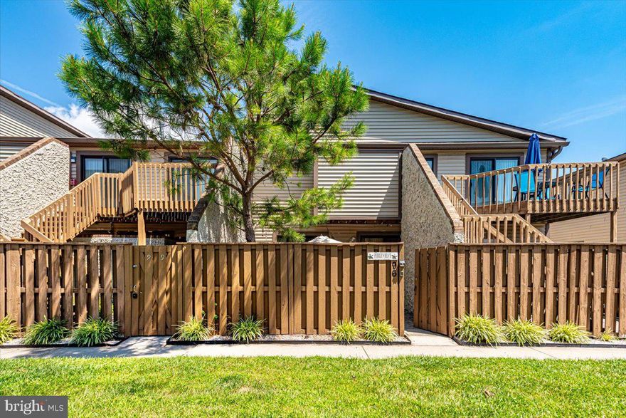 Imagine being a short distance to the ocean in an updated 2BR 2BA condo with community indoor and outdoor pools, racquet ball, and tennis courts! Your search has ended as this unit checks all the boxes.  This Club Ocean Villas condo features many upgrades including tile flooring throughout, brand new appliances, updated bathrooms with custom tile, crown molding, and beautiful paint colors and decor.  You enter through the courtyard to a private fenced in patio area that is perfect for grilling , entertaining outdoors, and has plenty of storage for all of your beach items.  You will love the first floor convenience and open floor plan with a spacious family room, Master Bedroom on one side and another large bedroom on the opposite side with slider that opens to the patio area. The secluded Master offers an en suite bath with new tile flooring, vanity and tiled shower. An additional remodeled full bath features a large soaking tub and shower. Recent exterior improvements include new sliders, windows, siding, and newly painted fence and porch.  You will not find a more centrally located unit near restaurants, shopping, and the beach with these amenities.  This is the perfect second home to start enjoying year round, or it would make an excellent investment property. Call to schedule your showing today.