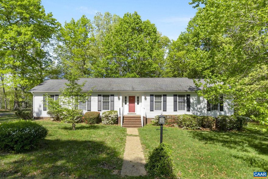 You will enjoy coming home to this 1800 square feet, three bedroom, two bath, one level rambler with detached garage that is privately situated on 5.59 acres. This spacious home features wood floors, separate living and dining rooms, brick fireplace in family room, and a large rear deck. The property is already subdivided into two lots (one with the home) and the added room off the garage which would make a great home office are super added bonuses! This is a nice one!,Wood Cabinets,Fireplace in Family Room