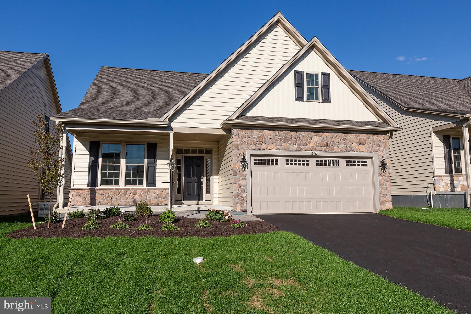 Our final quick delivery homes are perfect for an easy move. This popular Lexington II model with optional front porch is ready for you and includes three bedrooms, three baths, a 2nd floor loft, and an unfinished full basement. Features include luxury vinyl plank throughout first floor, a great room with a gas fireplace, a beautiful kitchen w/stainless and quartz, a sunroom which opens onto the patio. Your primary bedroom suite has a en-suite bath with tile shower, a double vanity and a spacious walk-in closet. Honeycroft Village is sidewalk community with lamp posts and street lights, a clubhouse with a fitness center & indoor pool for your year round enjoyment. Outdoor community vegetable gardens, bocce ball court, horse shoes & lots of groups & activities. Come see why so many have chosen to live their best life at Honeycroft Village. Located in Southern Chester County, close to farm stands, vineyards, Longwood Gardens and so much more.
