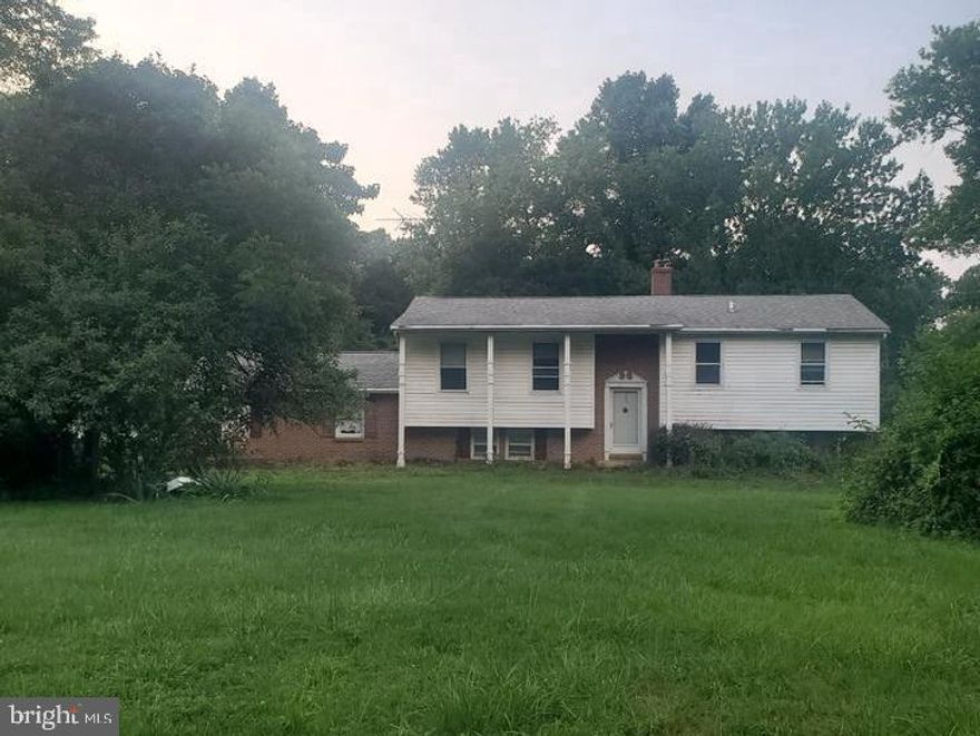 Nice acreage and very private area of Rising Sun.  Home needs some tender loving care.  Being sold as is.  

Call agent for more details!