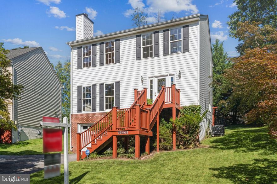 Fabulous Location:  Walking distance to the Glenmont METRO, and close to shopping and schools this beautiful 3 Bedroom, 2.5 Bathroom home is Move-In Ready.  Featuring sun drenched rooms and beautiful wooded views this home features New HVAC, New Roof,  Bright Modern Eat-in Kitchen, Beautiful Hardwood floors, Deck Opening to Spacious Backyard and a Convenient Attached Garage.