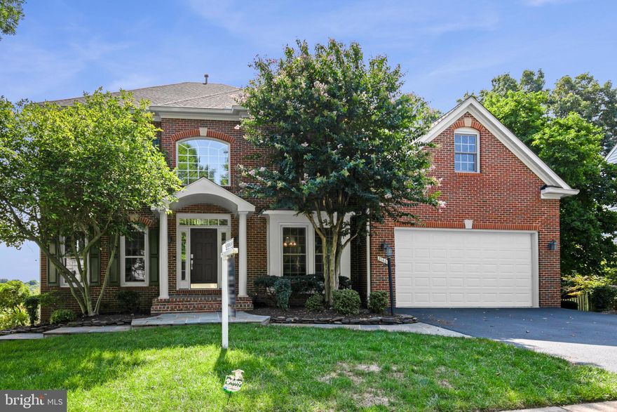 Step into style and comfort in this stunning colonial home - nestled on a spectacular lot with incredible vistas in the highly sought-after Broadlands neighborhood. This beautifully updated home offers nearly 5500 square feet of living space, including five spacious bedrooms, four and a half bathrooms, and a fully finished walk-out basement.

The home boasts exceptional curb appeal with a recently added front portico and a meticulously landscaped yard. There is a deck that runs the entire length of the home and offers the perfect spot to enjoy sunrises and views of the backyard -like a private nature sanctuary it is  terraced and filled with an incredible array of trees and plants - including a massive cherry blossom tree that offers incredible flowers in the Spring. 

Upon entering you are greeted with a remodeled craftsman style staircase, updated hardwood floors, a two-story great room filled with with abundant light, a large dining room with box window,  lovely living room. and a remodeled gourmet kitchen . There is an abundance of windows to fill every room with natural light, two sets of doors leading to the expansive deck, and a private home office  tucked away behind glass French doors offers a stylish and comfortable work-from-home space complete with custom built-ins and storage For added convenience, a remodeled laundry room with utility sink is also located on the main level. 

The stunning gourmet kitchen is a chef's paradise, featuring a spacious center island with ample seating, elegantly updated  white cabinets, luxurious quartz countertops, and top-of-the-line high-end appliances. This stylish culinary haven is ideal for both everyday cooking and entertaining guests. 

Upstairs, you'll find four spacious bedrooms, including the luxurious primary suite. The primary suite serves as a perfect retreat featuring a sitting area, a large  walk-in closet with a second washing machine and dryer and a luxury bathroom remodeled  for ultimate relaxation and comfort - including heated floors, heated towel rack, large shower with multiple shower heads and a separate spa bathtub. The three secondary bedrooms are generously sized with ample closet space and plush carpeting.

The bright and welcoming lower level is filled with natural light and provides an excellent space for movie nights and includes the 5th bedroom, the 4th full bath, and additional storage space.  Access to a delightful screened in porch completes the lower level.

There are over $250,000 in recent owner improvements including: new windows (2022), new roof (2017), new driveway (2023), new front portico (2022) , new upper level carpet 92021), primary bath remodel (2014), kitchen remodel (2019), new hardwood floors (2016), new HVAC (2015) and new  upper level compressor (2024). 

Living in Broadlands grants you access to a vibrant community with planned events, multiple pools, sports courts, a fitness center, playgrounds, and more. Enjoy nearby parks, walking trails, and recreational facilities, ensuring a lifestyle filled with leisure and enjoyment. Highly sought-after schools, and quick access to commuter routes and all your daily needs further highlight the incredible location. Every detail of this home has been thoughtfully designed to provide a luxurious yet comfortable living experience. Welcome to your new home in Broadlands!