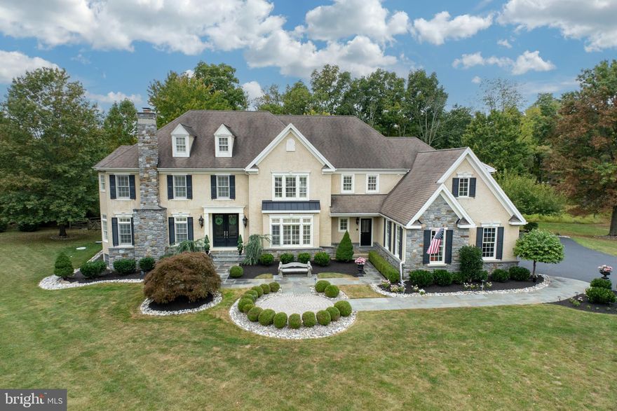 Introducing 1736 Chantilly Lane, nestled amongst the pastoral rolling hills in the idyllic neighborhood of Chantilly Farm, a premiere enclave of 34 luxurious estate homes. This exquisite CUSTOM home is set at the end of a quiet cul-de-sac, featured on a private, professionally landscaped 1 acre lot. This home will enthrall any buyer seeking an unparalleled Chester Springs location. The exceptional curbside presence sets the stage for elegance and luxury throughout, while maintaining an atmosphere of comfort and tranquility. Elegant doors welcome you into a stunning front to back foyer, with a formal living room with fireplace to your left, and a spacious dining room with a large window seat to the right. Off the living room, French doors lead you to a handsome study with a plethora of natural light. A charming butler’s pantry allows entertaining to flow seamlessly from the dining room into the kitchen. The gourmet chef’s kitchen is complete with radiant in-floor heating, custom cabinetry, custom arched doorways and a sizable walk-in pantry. This breathtaking kitchen is an entertainer's dream! Outfitted for the most discerning chef, the massive island is flanked with beautiful granite countertops. The appliances have been upgraded including new dishwasher (2019), new microwave (2020), new kitchen faucet in (2022) and new double oven (2024). The adjoining breakfast room offers ample natural light and room for an oversized dining table. Step down into the impressive family room with fireplace and gorgeous coffered ceilings, overlooking the expansive, 3 tired maintenance free deck with gazebo. This gorgeous outside retreat offers 2 retractable awnings and an under-ground irrigation system, which completes the exterior of this manicured and well lit yard. And yes, there is room for a pool! A large mudroom with custom cabinetry offers 2 entrances into the home, off the front and the garage. A second staircase is conveniently situated to take you to the upper level, where you are welcomed to the elegant and inviting primary suite, with custom plantation shutters, tray ceilings and a spacious custom walk-in closet. The sumptuous primary bath is meant for pure serenity, with a soaking tub and large shower with built-in bench and glass door. This level also boasts 4 additional oversized bedrooms, complete with en suite bathrooms and one with a Jack and Jill bath. The laundry room completes this floor with an abundance of counter space and cabinets. There is nothing left to the imagination when entering the fully finished walk-out lower level! The main area features an expansive lounge area, with custom built-in cabinetry, adjacent to another open area for games and entertaining. A separate home gym allows for an enjoyable work-out any time of the day! BUT…. the PIECE de RESISTANCE….the opulent STATE OF THE ART IN-HOME THEATER, with 12 theater grade reclining chairs, complete with ticket booth, professional pop-corn machine and concession stand, is unparalleled! You are instantly transformed to the grande old days at the theater! There is even a marquee to showcase the latest movies!  A fully equipped kitchenette with new refrigerator and large island completes this space. Built by renowned Moser Homes, this meticulously maintained home has over $400K of upgrades from previous owners. The 4 car garage with custom built-in cabinetry is complete with a PET WASHING STATION. FULL HOUSE GENERATOR, California plantation shutters throughout, new septic (2016), two new HVACS (2018), the list goes on and on-this home has it all. Situated in the award winning Downingtown EAST SD, and acclaimed STEM Academy, as well as neighboring Montgomery School. Minutes from all major roads, including PA Turnpike, Rt 30 and  Rt 202 for easy commuting. Convenient to wonderful restaurants, markets and retail shopping nearby. Don't miss this opportunity to experience living in the highly desirable and much sought after Chantilly Farm!