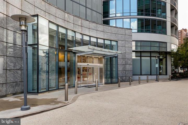This corner unit on the 42nd floor of the Murano Penthouse collection residence boasts stunning city views, two large bedrooms, two full bathrooms, floor-to-ceiling windows, bamboo floors, and a private covered balcony. You'll also have access to an assigned garage parking spot and an assigned storage unit. The Murano offers impressive amenities, including a 60-foot indoor heated swimming pool, a state-of-the-art fitness center, a landscaped sun deck, 24-hour concierge service, on-site building management, and a maintenance team. The open kitchen features imported cabinets, granite countertops, a large breakfast bar, and stainless steel appliances. The bathrooms include chrome fixtures, tile floors, and large vanities with ample storage. With its prime location steps away from Rittenhouse Square, Trader Joe's, Whole Foods, fine dining, unique shopping, 30th Street Station, the Schuylkill River walking and bike path, museums, and more, this is a fantastic opportunity to lease an exceptional unit. Don't miss out!