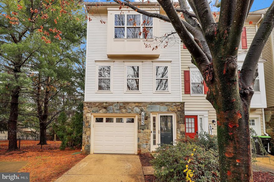Welcome Home!
A gorgeous stone end-unit townhome in sought-after Fountain Hills! This bright 3BR, 2.5BA home with a one-car garage features fresh 2025 interior paint, new roof and garage door (2024). The spacious first-level family room boasts brand-new laminate floor (2025), convenient laundry area, and a walkout to a private deck overlooking mature trees. The open-concept main level offers sweeping views from three sides, a bay window, hardwood floors (2021), and crown molding. The well-appointed kitchen includes stainless steel appliances, wood cabinetry, ample workspace, and a cozy island. Upstairs, enjoy bright bedrooms with vaulted ceilings, including a comfortable primary suite and all updated bathrooms. Just steps from the community pool and clubhouse, with unassigned parking and convenient bus access. Across the street, Kings Park Village offers shops, dining, and groceries, while nearby Gunners Branch and Seneca State Park, I-270 access, and TopGolf make commuting and recreation a breeze.  Book your private showing today!