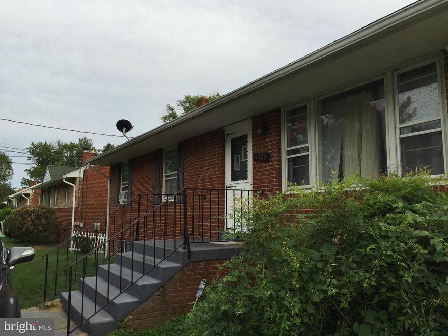 This home is located in a great neighborhood. The home has 4 large bedrooms, hardwood floors throughout the main level, and a large basement with very high ceilings in the basement. The basement features a fireplace, a large bedroom that could serve as a second master or in-law suite, full bathroom and a enclosed porch downstairs. This house needs work!