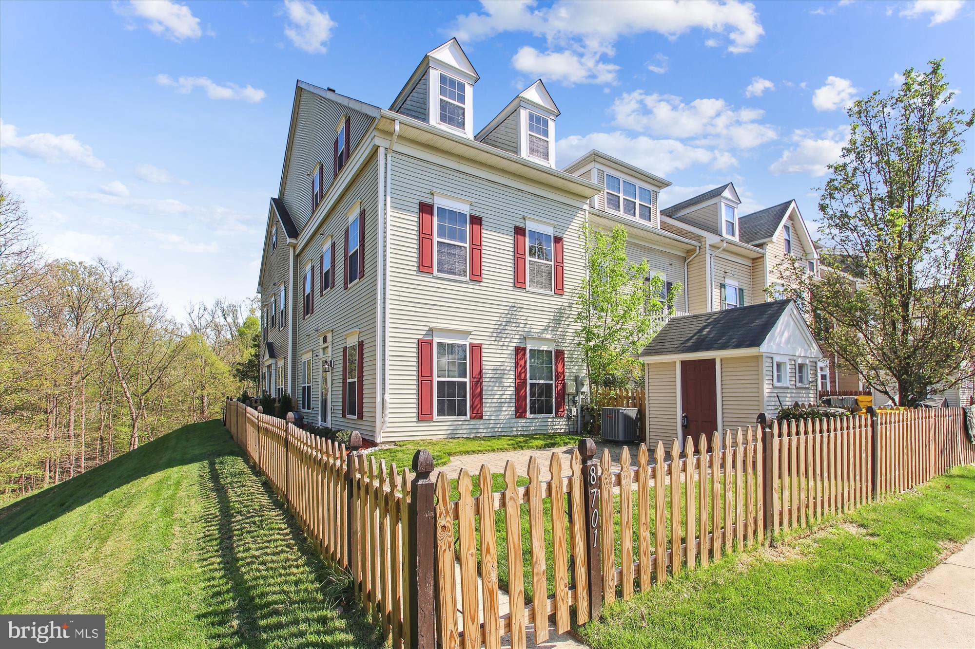 Nestled within the highly sought after community of Piney Orchard, this updated 3 level end unit townhouse offers the perfect blend of spacious living and desirable location!! The exterior features a quaint fenced yard, patio and shed, siding to a serene forest of trees; perfect for your four legged little ones. Inside, you'll find a home that has been completely refreshed, from new paint to upgraded light fixtures, carpet, ceiling fans, and even a brand-new refrigerator and microwave. Natural light floods the living spaces through sun-filled windows, highlighting elegant crown molding and a cozy corner gas fireplace in the spacious living room. The kitchen boasts generous cabinetry, granite counters, stainless steel appliances, and an adjacent dining room for easy entertaining. On the first upper level, you'll discover two bedrooms, a full bath, and a convenient laundry room with storage cabinetry. As you ascend to the top floor, a private primary bedroom suite awaits, featuring a vaulted dormer ceiling, a sitting area, two walk-in closets, and an en-suite bath with a double vanity. Your new home includes two assigned parking spaces for your convenience. An abundance of resort-style amenities await you in Piney Orchard including community pools including an indoor lap pool, bike paths, playgrounds, clubhouse with fitness center and banquet rooms, and more! Short distance to Piney Orchard Marketplace, major commuter routes, MARC train, BWI Airport, Fort Meade, shopping, dining, and entertainment options. Property Updates: interior paint, light fixtures, carpet, ceiling fans, shower head, refrigerator and microwave, and landscaping.This townhouse is part of 2 associations. The monthly amount of HOA dues is an average of the 2 HOA totals. Piney Orchard Community Association is the primary HOA. the fee is $288.19 bi-annually. This association is managed by Property Management People, Inc. The sub HOA is the Vineyards of Piney Orchard. the fee is $342.71 quarterly. This association is managed by FirstService Residential. The total equates to approximately $163 monthly. This is a terrific deal for multiple pools, recreation center, jog/walk paths, tot lots, tennis, basketball, something for everyone. Convenient to grocery stores, shops and restaurants. Home shows beautifully but is sold "AS-IS."