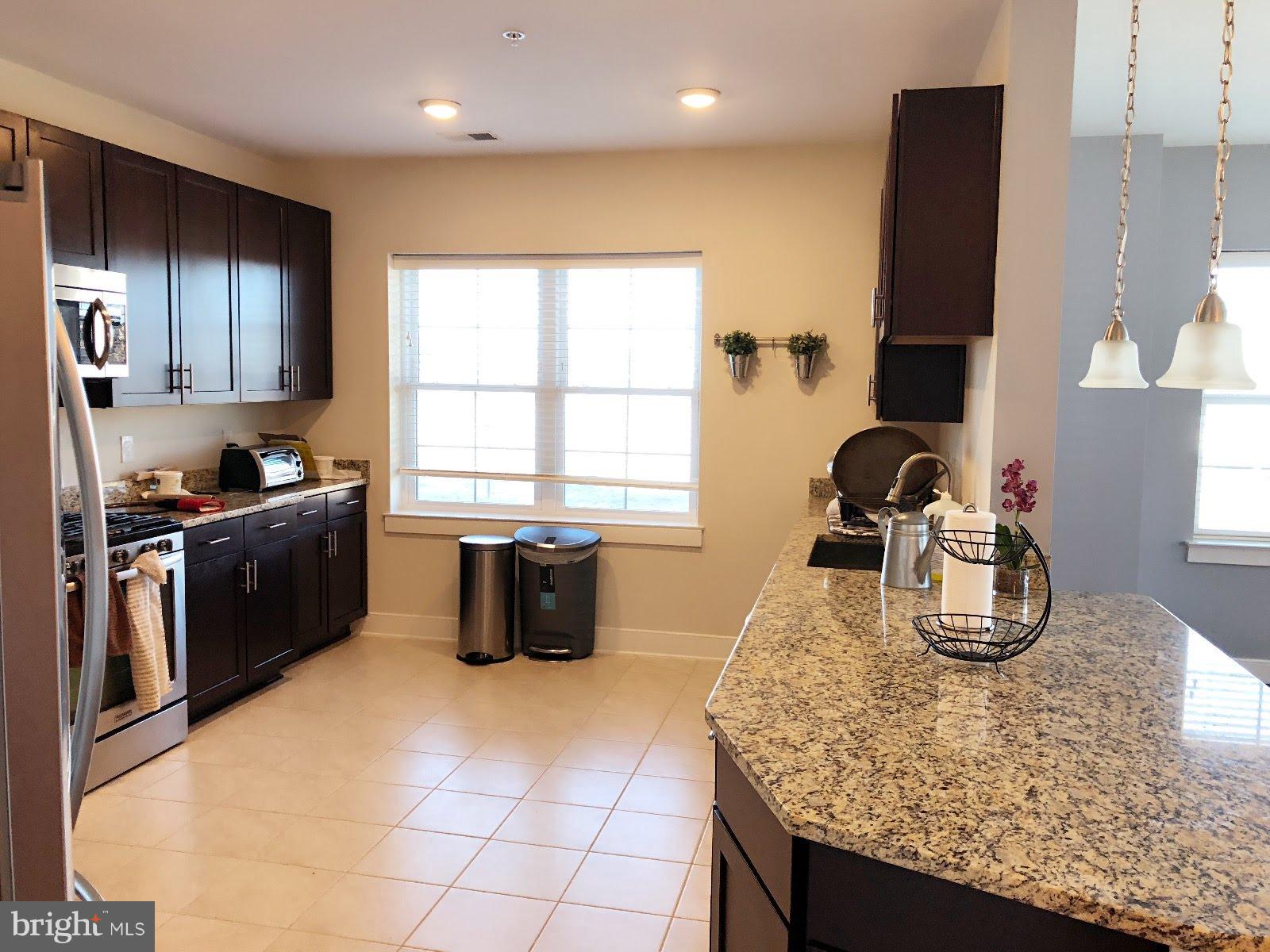 FLATS AT METROWEST - Residential Lease