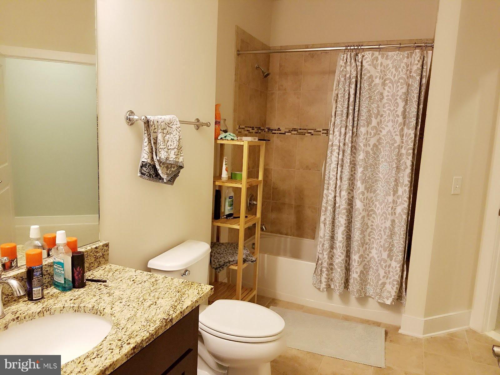 FLATS AT METROWEST - Residential Lease