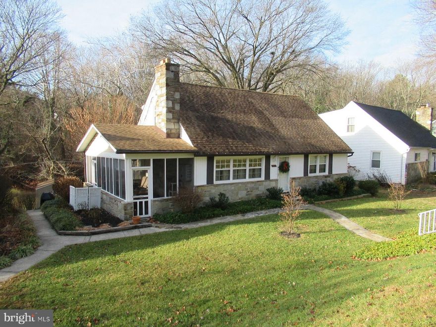 BACK ON THE MARKET!   From the moment you step in the front door of this charming 4 bedroom, 3 bath Cape Cod, you’ll feel comfortable, welcome and at home.  The warm and inviting living room is enhanced by a classic stone wood burning  fireplace with stone mantle and hearth. There are hardwood floors throughout the home.  The country kitchen with breakfast bar and adjoining dining area make meal times super easy and convenient.  New stainless steel refrigerator and dishwasher!  Oak cabinetry and Silestone counter tops.  The door off of the dining area leads to a delightful screened porch…perfect for crab feasts and cookouts or simply for enjoying your morning coffee or your favorite beverage at the end of the day.  On the main level are two bedrooms with ample sized closets and a full bathroom which has recently been nicely refurbished.  The upper level hosts two large bedrooms and another refurbished full bathroom.  There’s plenty of storage space in the closets here.  In the lower level you’ll find a wonderful family room with a walk-out to the  rear yard.  A full bathroom with shower stall has recently been added on this level. You'll find a  laundry, utility and storage room  here...plenty of space!  Use the ground level door to step outside where you’ll enjoy the serenity and all that nature has to offer.  At times, you may hear the trickling of the quiet brook at the end of the property and you’ll enjoy observing wildlife in this pastoral setting.  A storage shed for all of your lawn equipment is located here.  Located on a very lightly traveled street which ends at the Country Club of Maryland golf course, this home is very convenient to retail shopping, churches, restaurants, grocery stores and a library.  Just minutes from the heart of Towson.