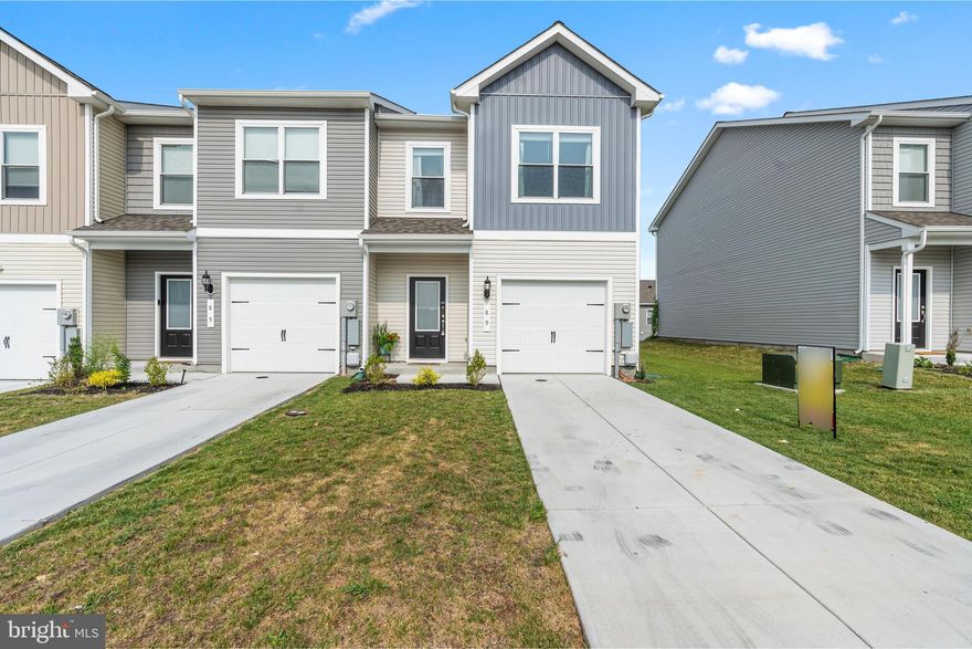 Welcome home to 89 Cramsford Street! Recent Price Cut! Modern, low-maintenance Living in the convenient Falling Waters Municipality! An end-unit in the Homeplace at Riverside community, the star feature of this property is the oversized, meticulously improved grounds. Featuring a recently hardscaped patio, shrub/bush/flower variety, a brand new wood perimeter rear fence, and even a motorized retractable awning. The property also has efficiency features, including energy-saving HVAC, lighting, and hot water heater units. The property is conveniently right across the street from the overflow parking lot, providing ample parking for your extra vehicles, and your guests! This property is in a USDA Eligible area, which offers the possibility for a 0% Down loan! Don't wait, this property won't last long! Call today to schedule your private tour.