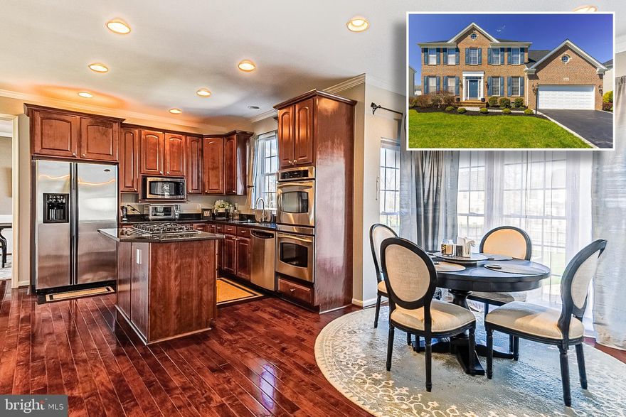 BEAUTIFULLY DESIGNED COLONIAL IN DESIRABLE CHAPEL GROVE WITH OVER 2,800 SQ. FT. OF LIVING SPACE!  Features include gleaming hardwood floors throughout the main level, a formal living room and dining room with crown molding & chair rail, gourmet island kitchen with cooktop, double wall oven, ss appliances, and granite counters, an inviting family room with gas fireplace, convenient main level laundry and half bath, expansive Primary bedroom suite with a sitting area and spa bath with double vanities, large soaking tub, and a separate shower, 3 additional bedrooms with a shared bath, a full walk-out basement that is perfect for storage or could be finished for more living space, a large custom paver patio overlooking the fully fenced yard, a 2 car garage with additional driveway parking, and a new roof!  Community pool and playground and walking distance to the B&A trail extension, several hiking trails, and Gambrills Community Sports park.  Pack your bags and move right in!