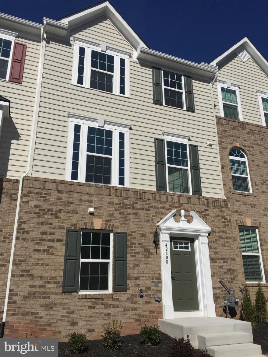 Happy Holidays and make this beautiful 4-bedroom, 3.5-bath townhome Yours!  Featuring a bright and open layout, a walk-out basement, and a spacious 2-car garage. The main level offers a comfortable flow with hardwood floors in the kitchen, living and dining area, along with plush wall-to-wall carpeting in the stairs, and bedrooms.

The modern kitchen is equipped with stainless steel appliances, granite countertops, and generous cabinet space—perfect for daily living and entertaining. Large windows throughout the home allow for abundant natural light, creating a warm and welcoming atmosphere.

Ideally located near Arcola Town Center with access to great shopping, dining, and entertainment. Commuters will appreciate the convenient proximity to I-66, Route 28, and the Dulles Toll Road (267).